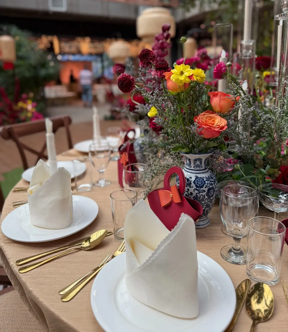 Elegant wedding banquet table setting with floral centerpiece in Kuala Lumpur by Teaffani Catering
